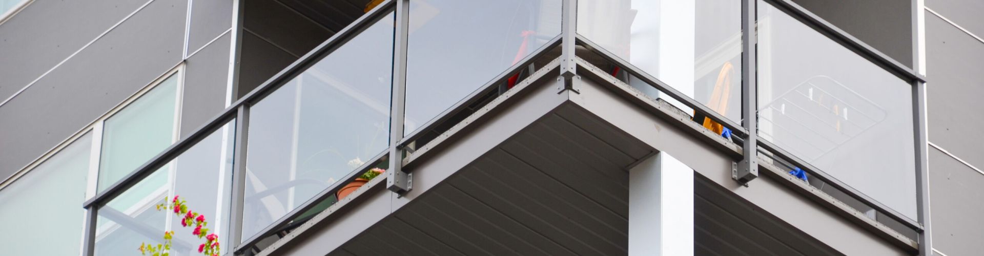 Glass Railing with top bar and facia mount by DekSmart