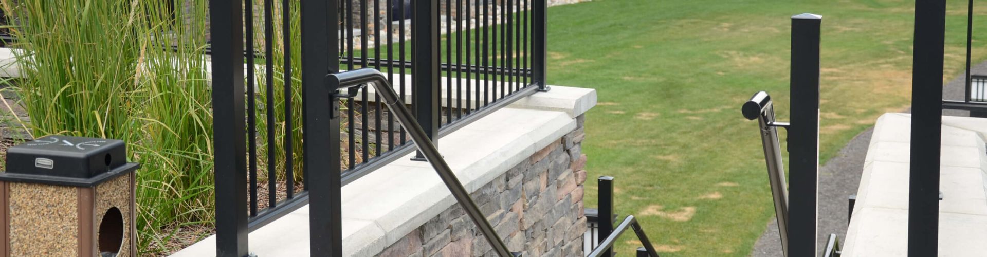 DekSmarts black Pipe Rail, a stair hand rail and picket rail
