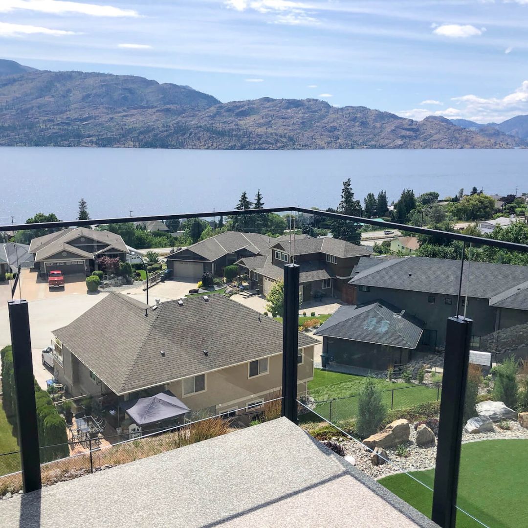 Glass railing kit with thin top bar in West Kelowna, BC, Canada