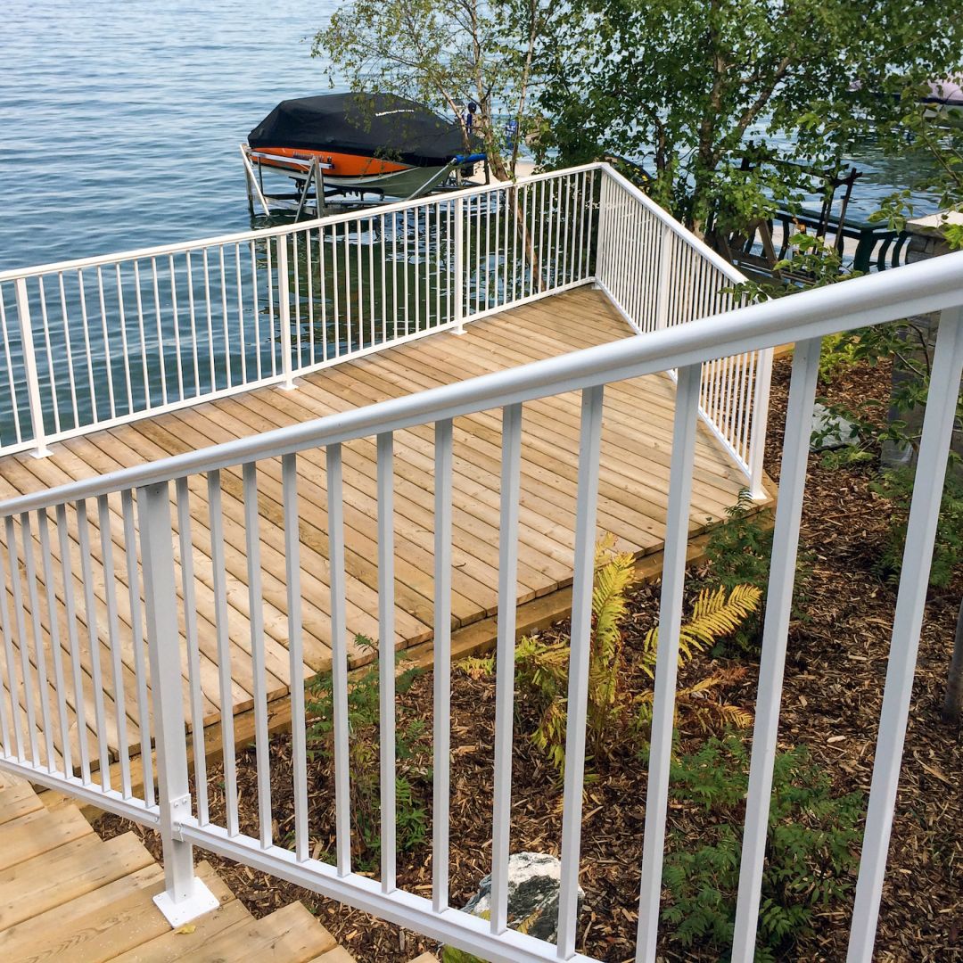 Deksmart aluminum picket railing system in white with 5/8th inch square pickets