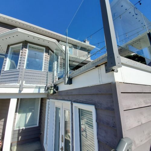 Fascia mount glass railing with grey aluminum railing