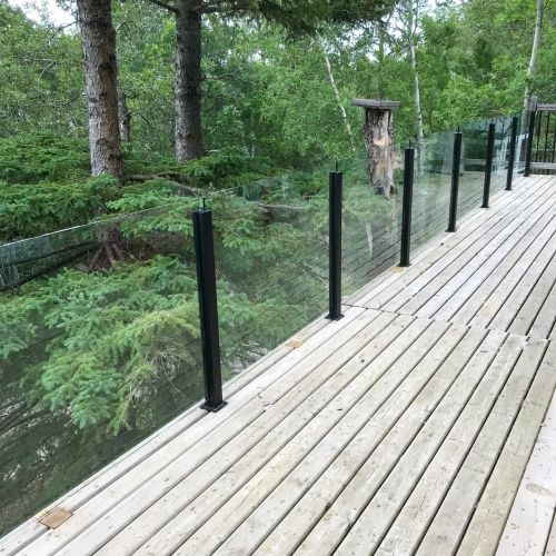 DekSmart Railings frameless glass railing w/ surface mounts.
