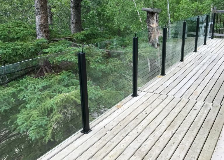 DekSmart Railings frameless glass railing w/ surface mounts.