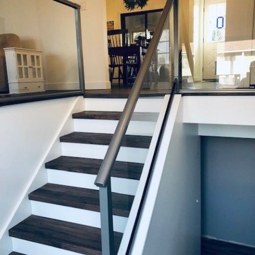 DekSmart Railings modern interior glass railing for stairs with black rail brackets (Royal Railing)