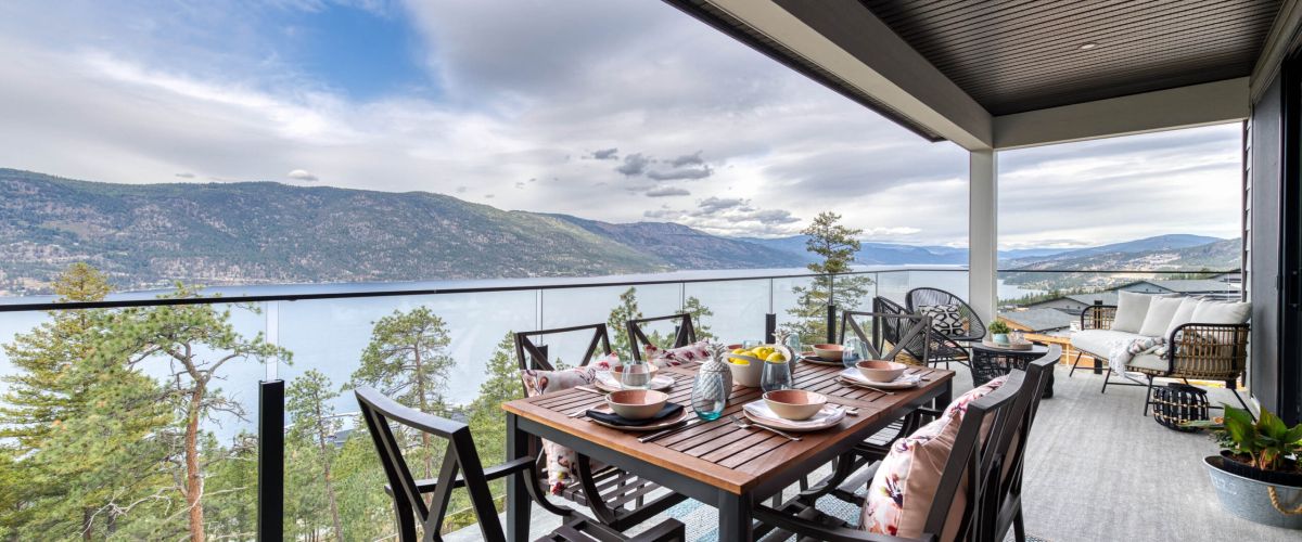 A 10mm Glass Railing with top bar installed on the balcony of a new house in the Okanagan Valley