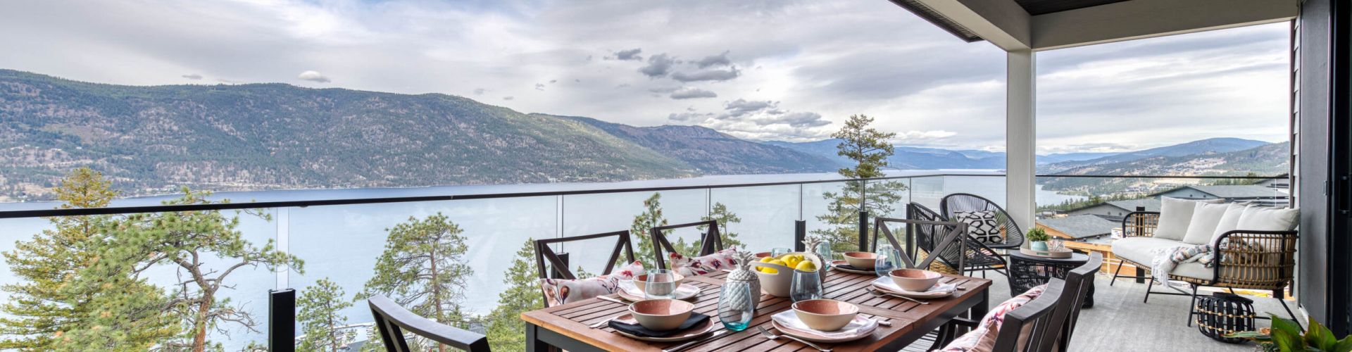 A 10mm Glass Railing with top bar installed on the balcony of a new house in the Okanagan Valley