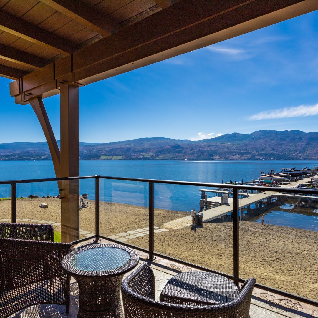 Black Glass Railing on a waterfront property on Barona Beach by Jane Hoffman