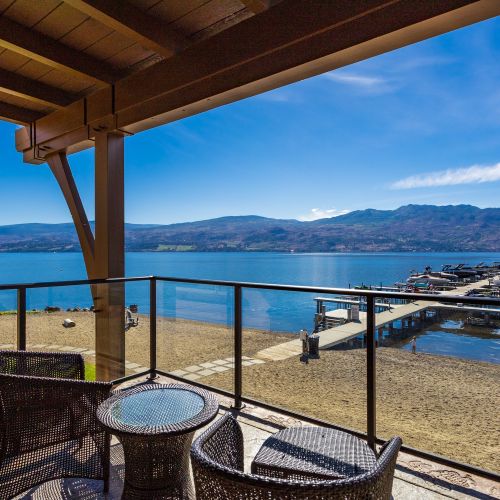 Black Glass Railing on a waterfront property on Barona Beach by Jane Hoffman