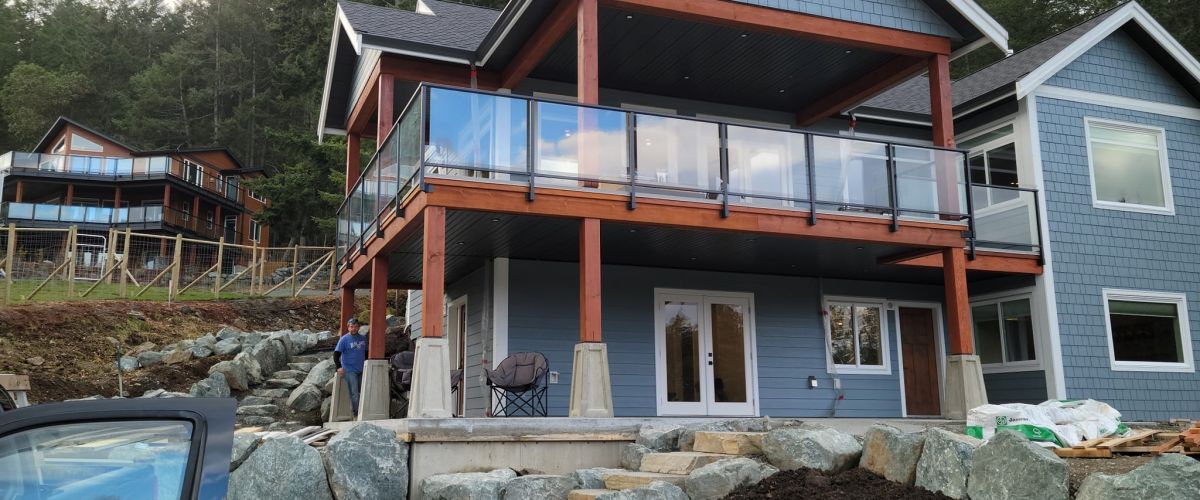 Dads Weatherdek Glass Railings by DekSmart Railings with fascia mount.
