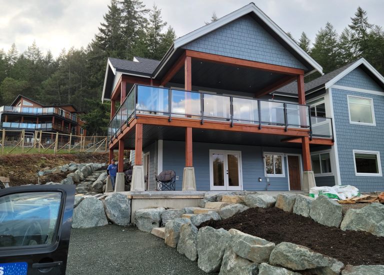 Dads Weatherdek Glass Railings by DekSmart Railings with fascia mount.