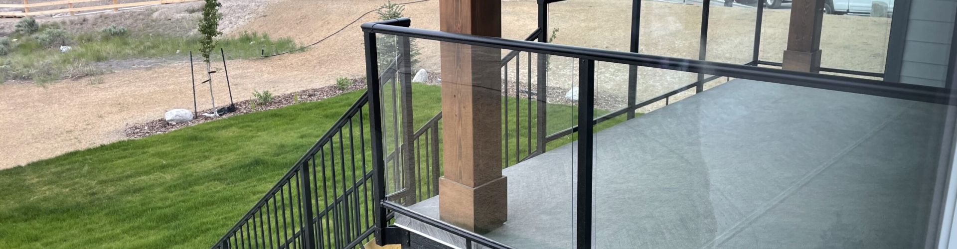 DekSmart Glass Railing and black picket stair railing
