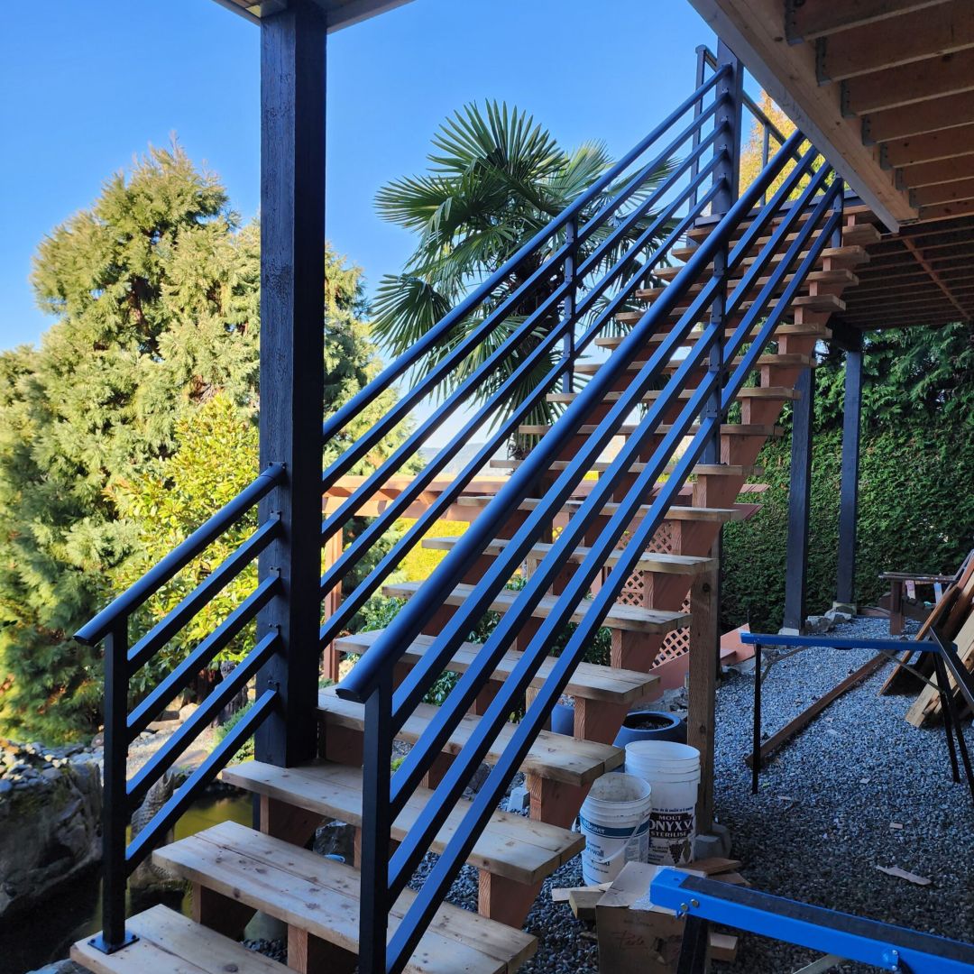 DekSmart custom black aluminum stair railing created for Dads Weatherdek