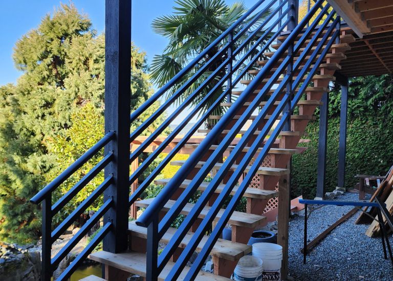 DekSmart custom black aluminum stair railing created for Dads Weatherdek.