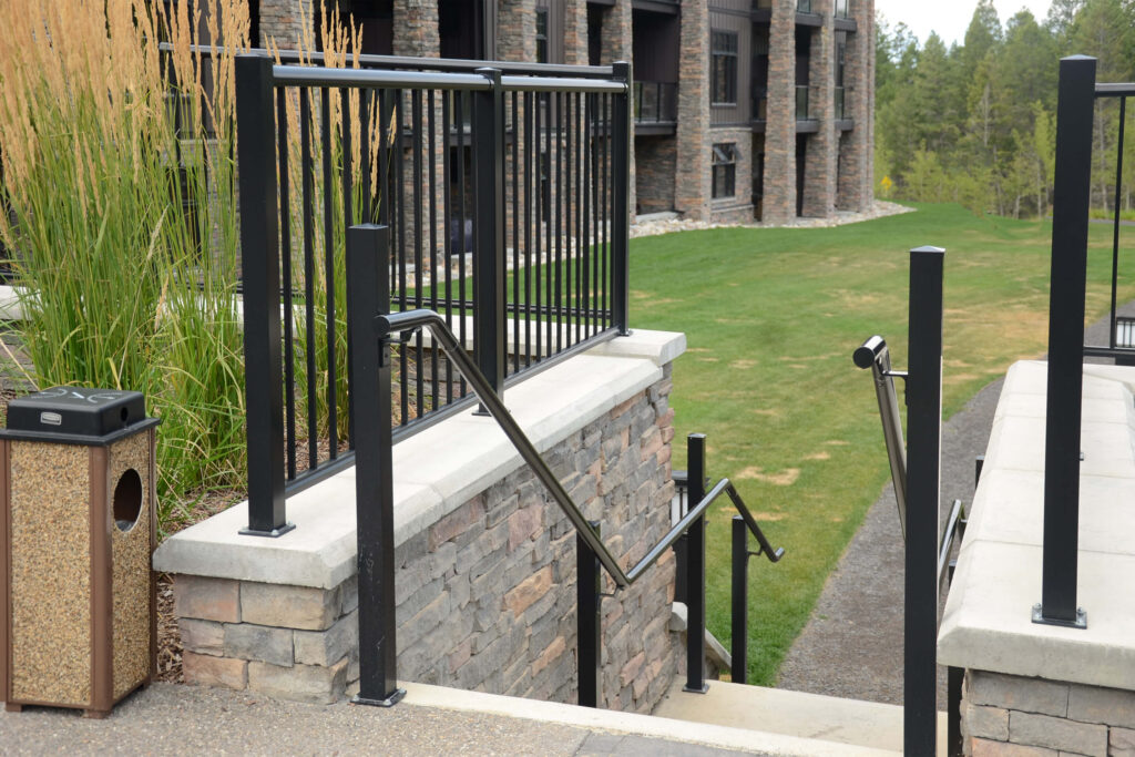 DekSmarts black Pipe Rail, a stair hand rail and picket rail