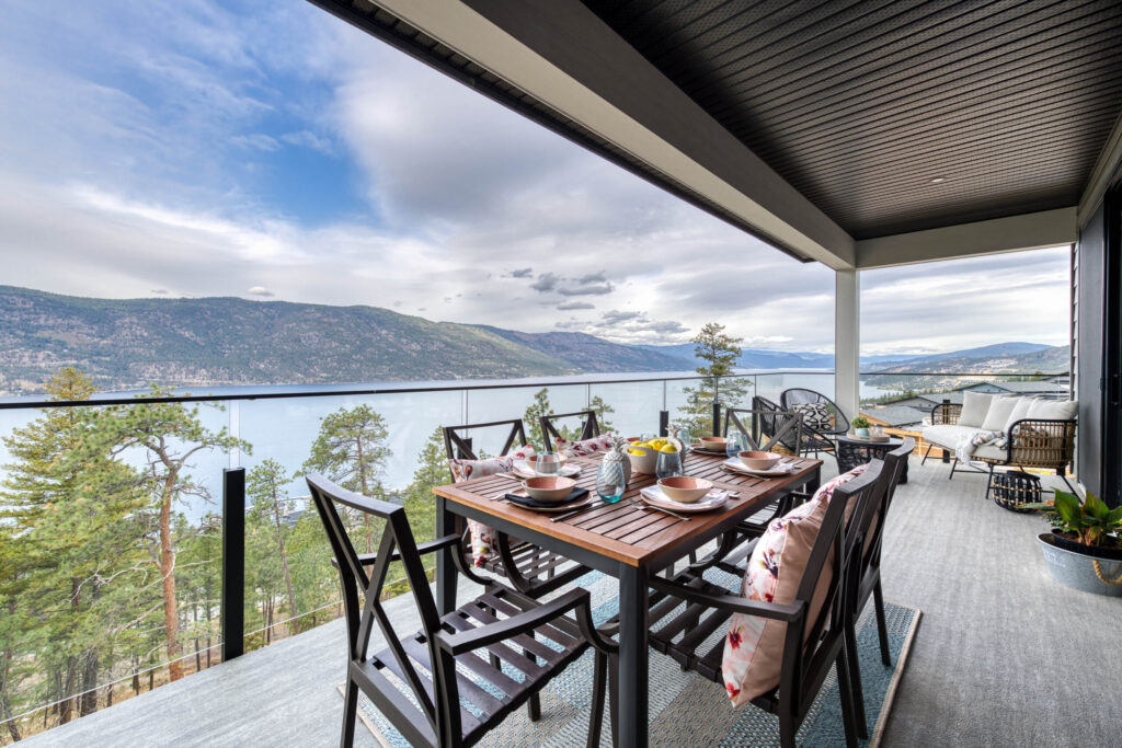 A 10mm Glass Railing with top bar installed on the balcony of a new house in the Okanagan Valley