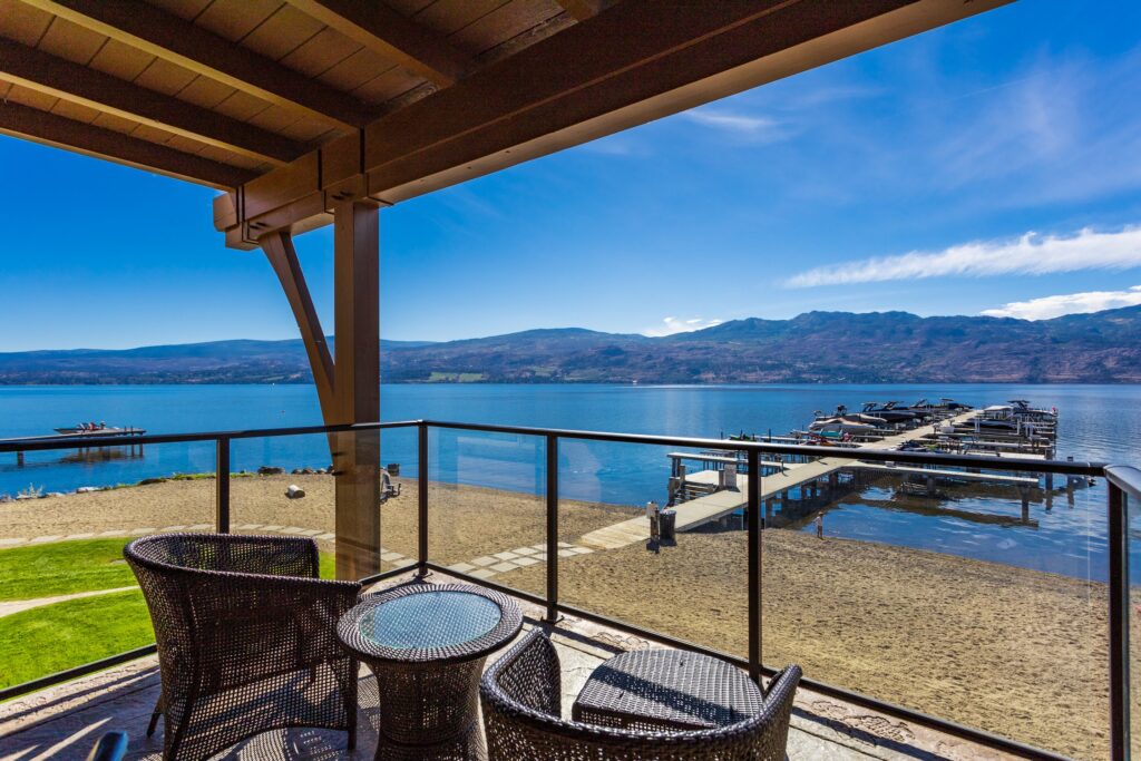 Black Glass Railing on a waterfront property on Barona Beach by Jane Hoffman