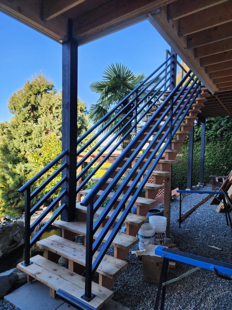 Custom black aluminum stair railing created for Dads Weatherdek